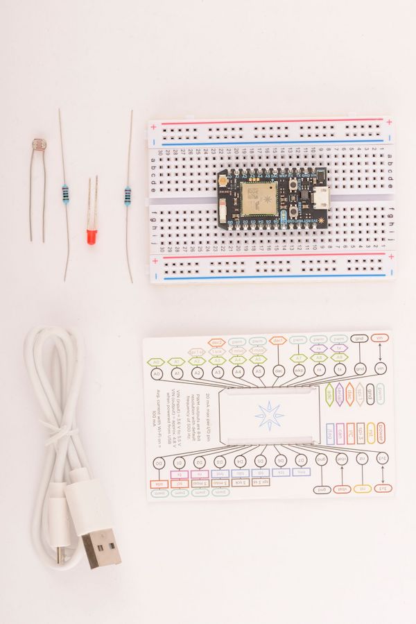 The breadboard insert for the photon kit, which showed the pinout for the board and an easy first project